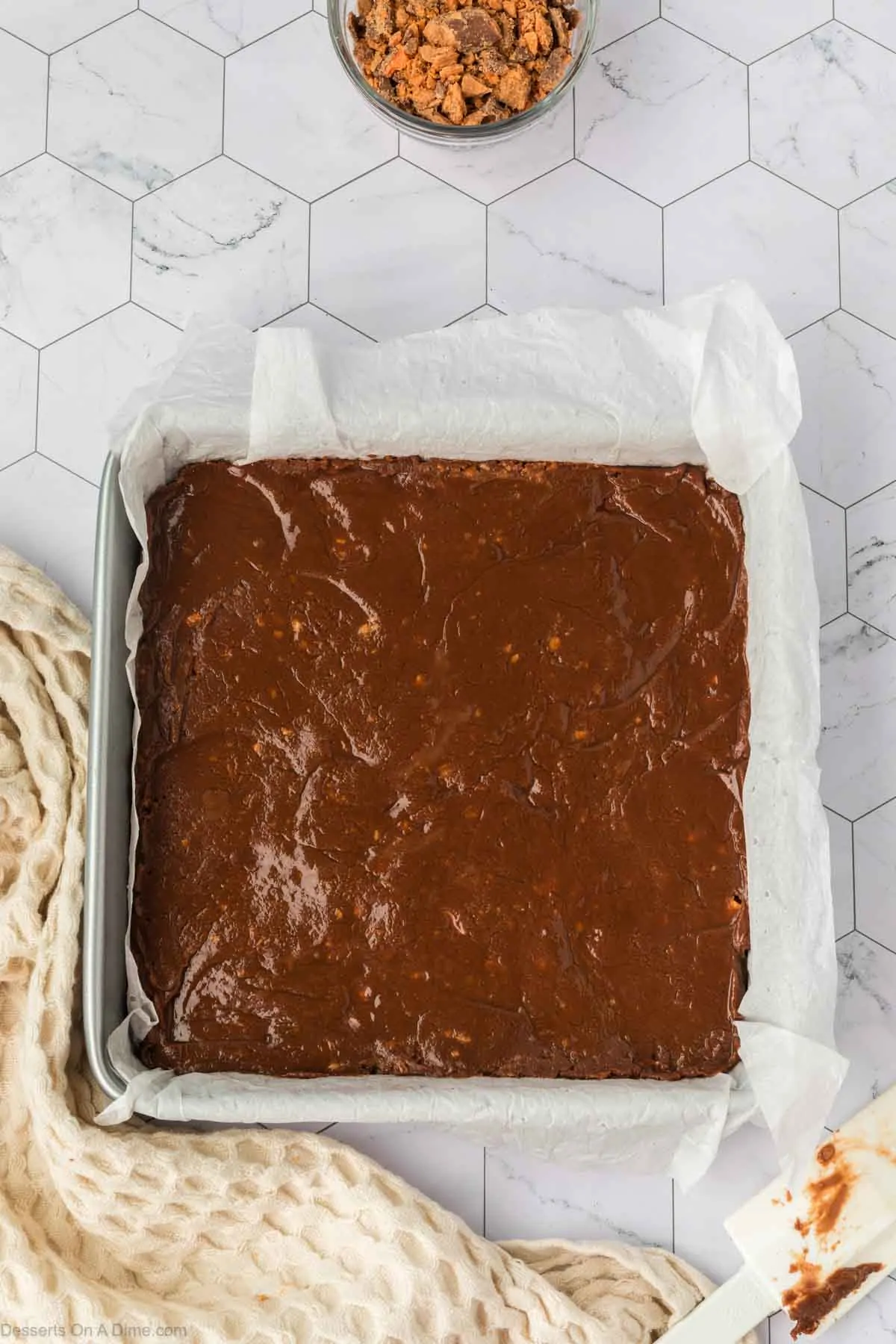 Fudge mixture spread into pan.