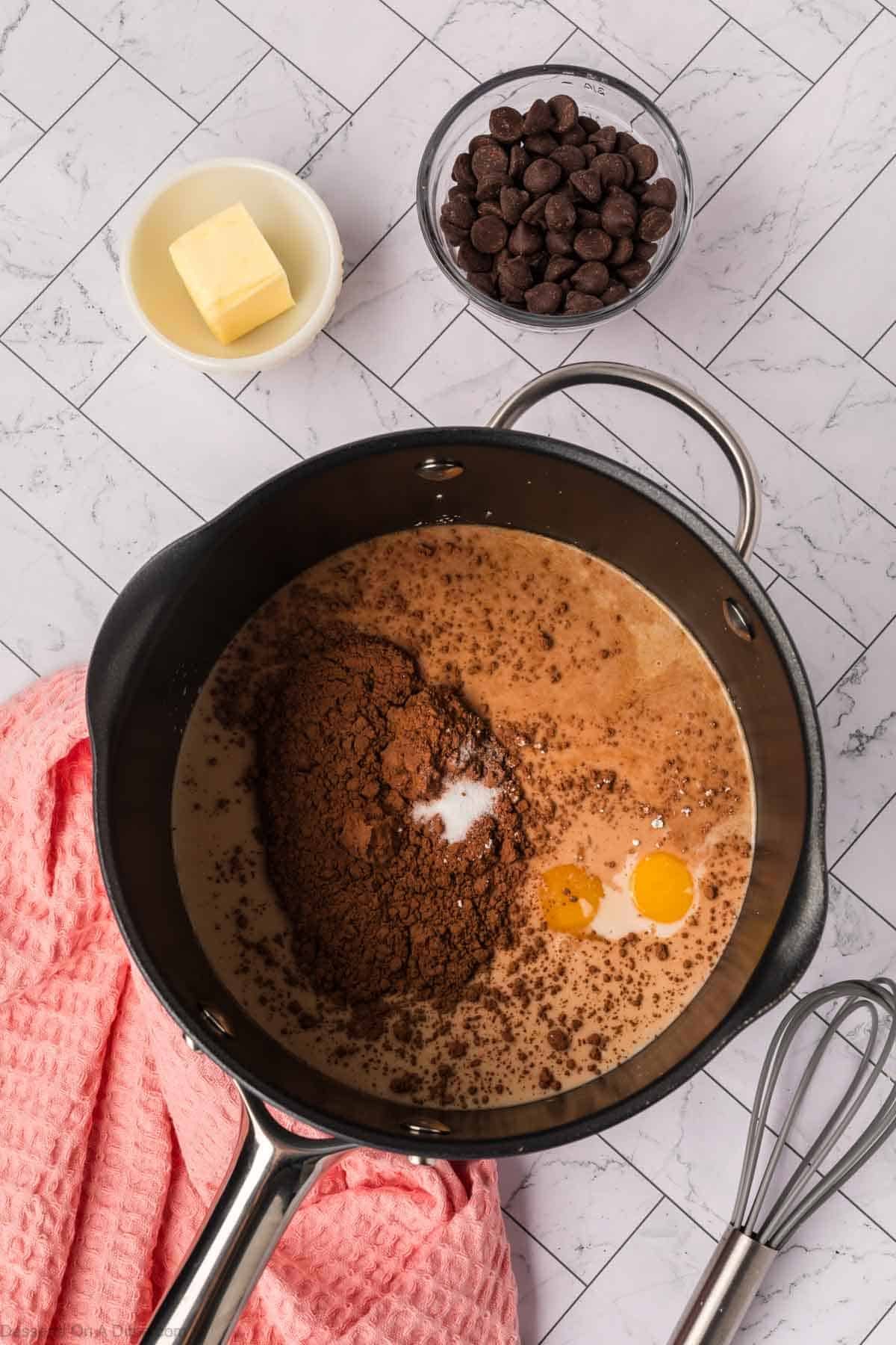 Ingredients combined in saucepan.