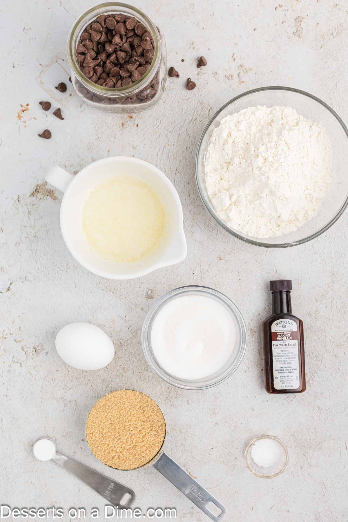 Ingredients for air fryer pizookie - butter, sugar, brown sugar, vanilla, egg, flour, baking soda, salt, milk chocolate chips. 