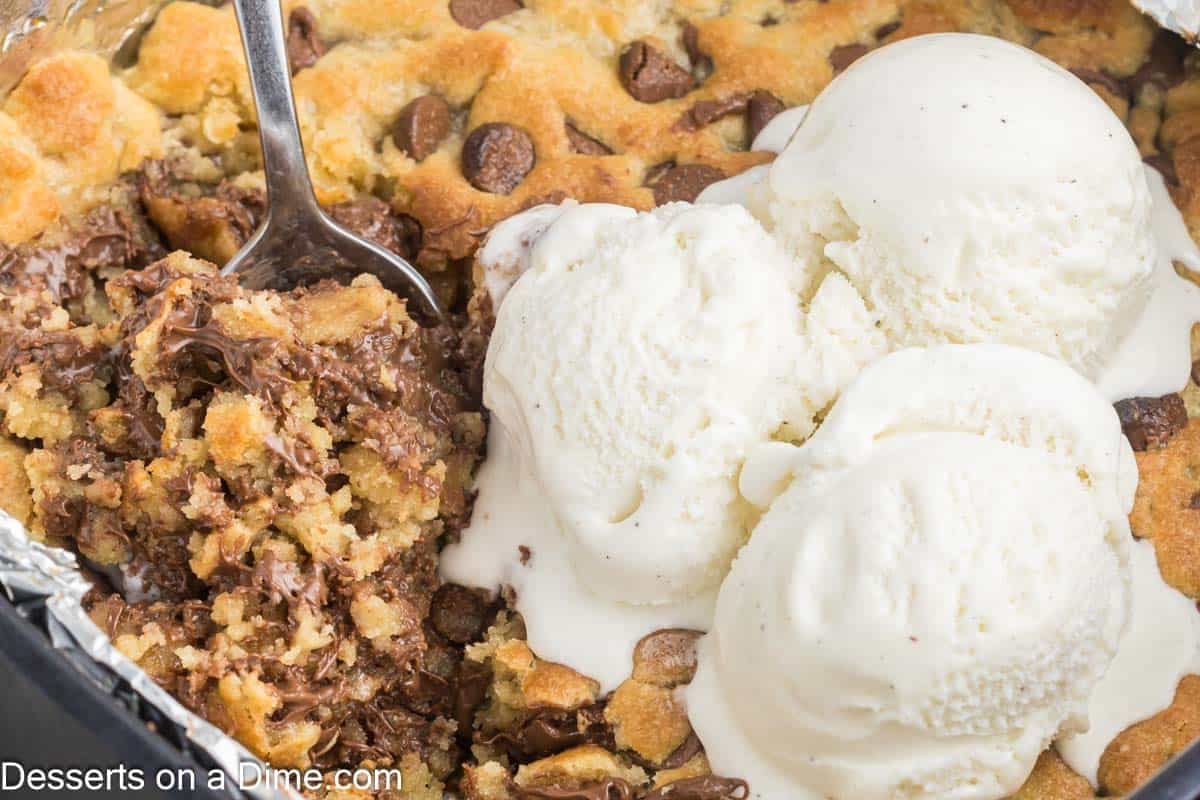Air Fryer Pizookie topped with ice cream. 