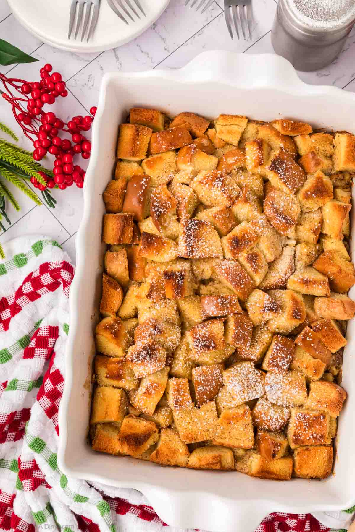 Eggnog Bread Pudding topped with powdered sugar. 
