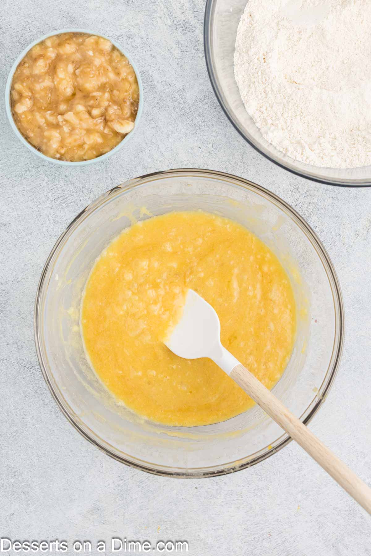 Crushed pineapple folded into mixture. 