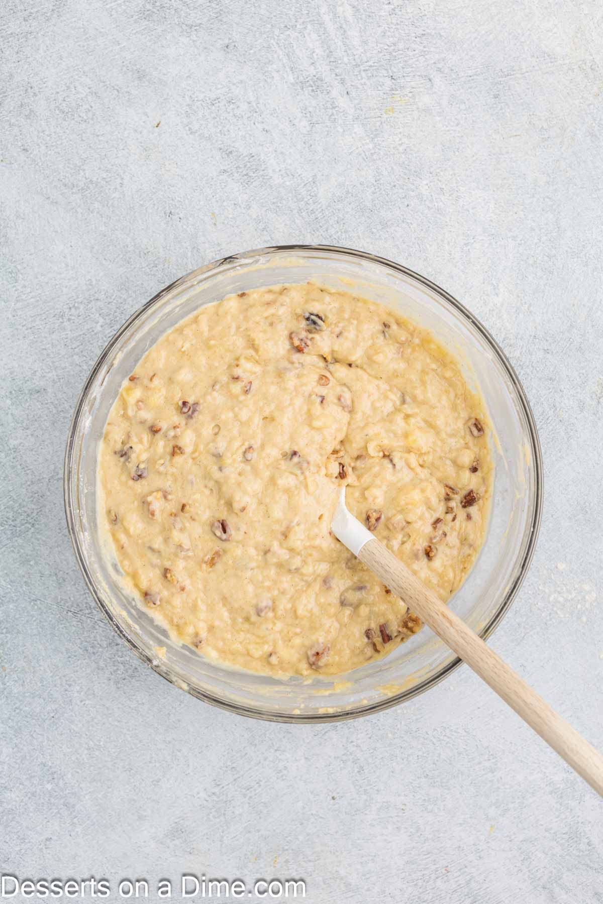 Nuts added and dry ingredients folded into wet ingredients. 