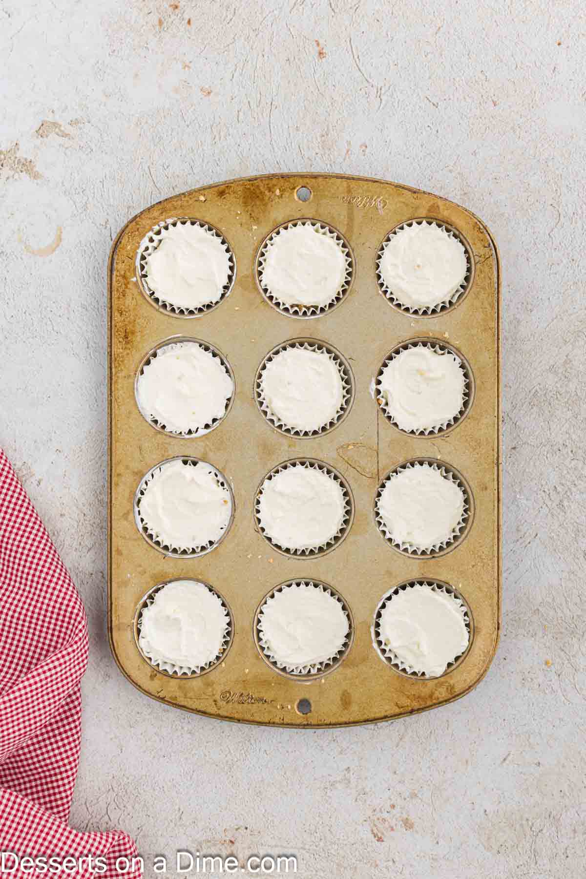 Cream cheese mixture in muffin tin. 