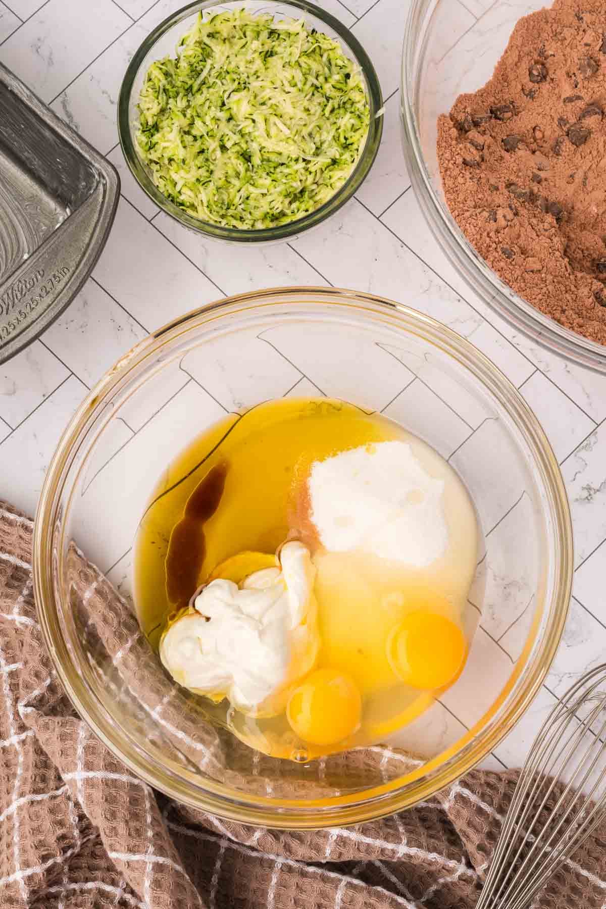 Separate mixing bowl with wet ingredients.