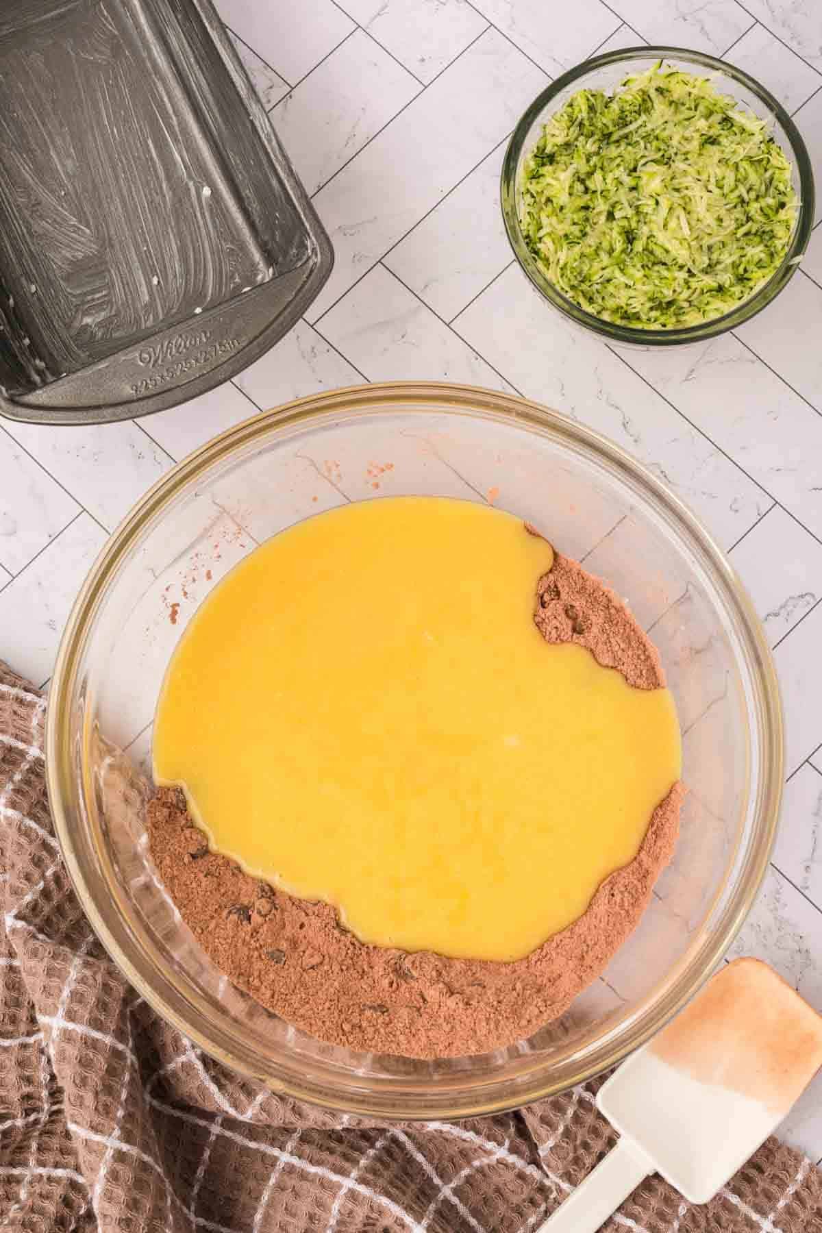 Wet ingredients poured into dry ingredients.