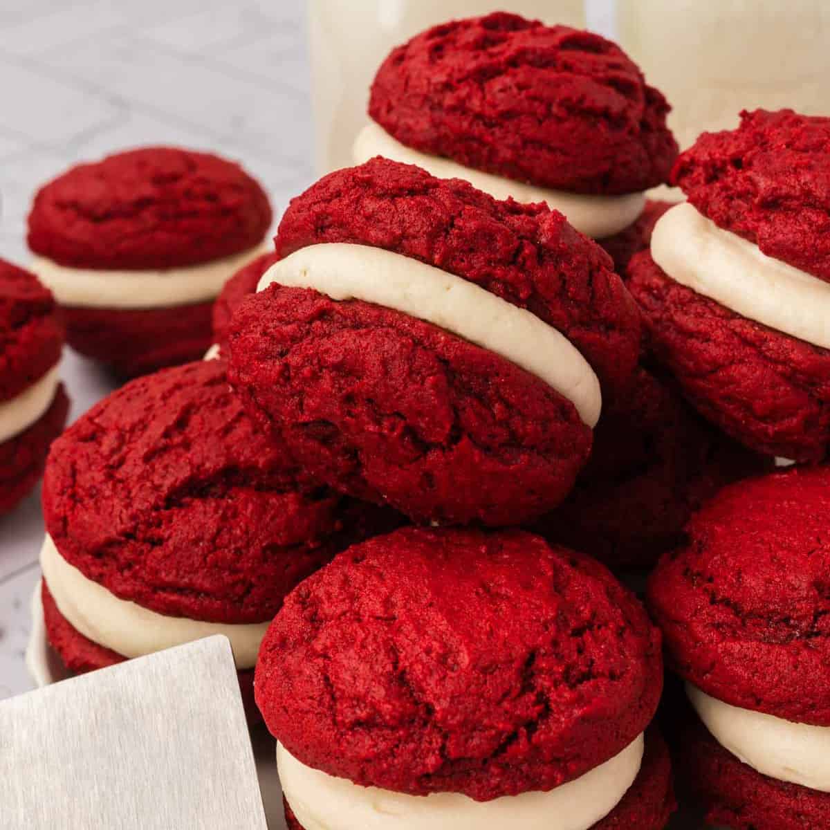 Red Velvet sandwich cookies stacked together.