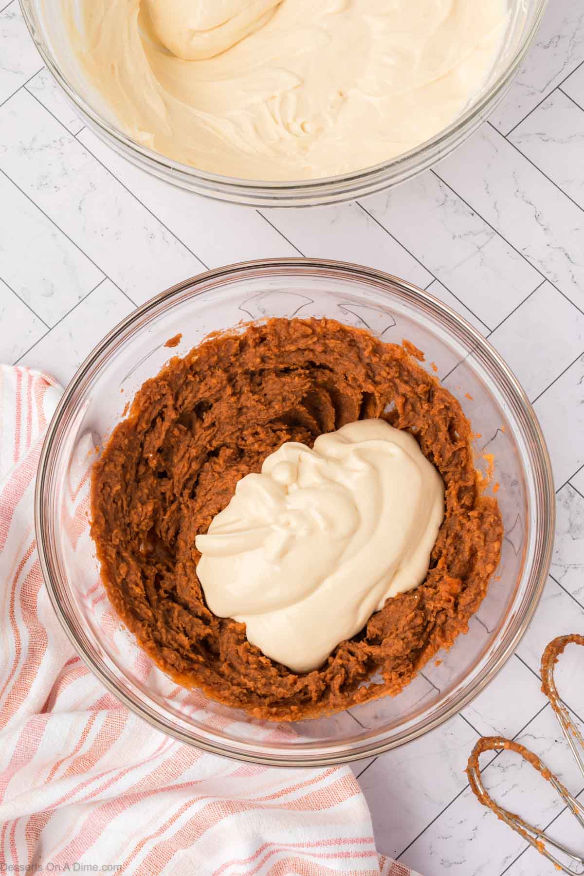 Cheesecake mixture added into filling. 