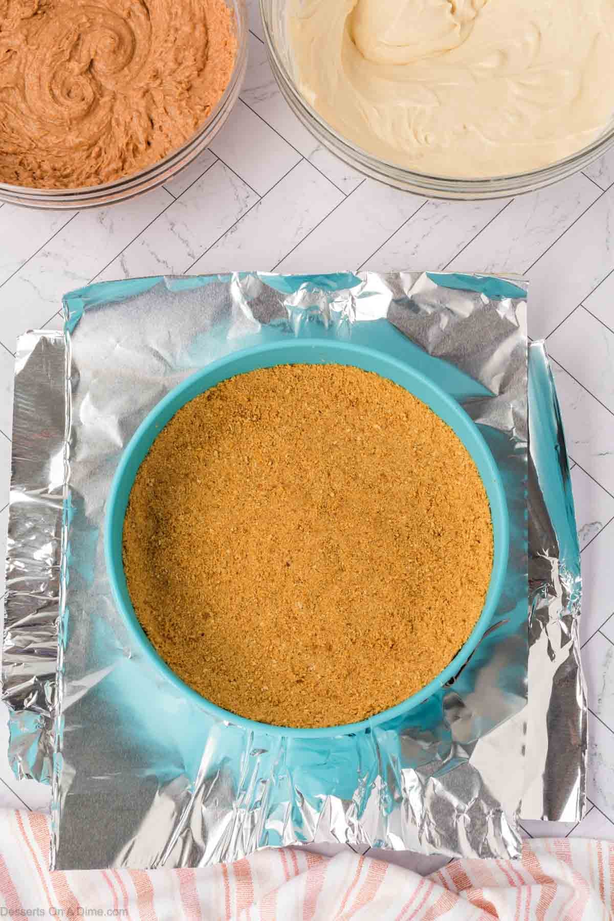 Graham cracker crumbs pressed into pan. 