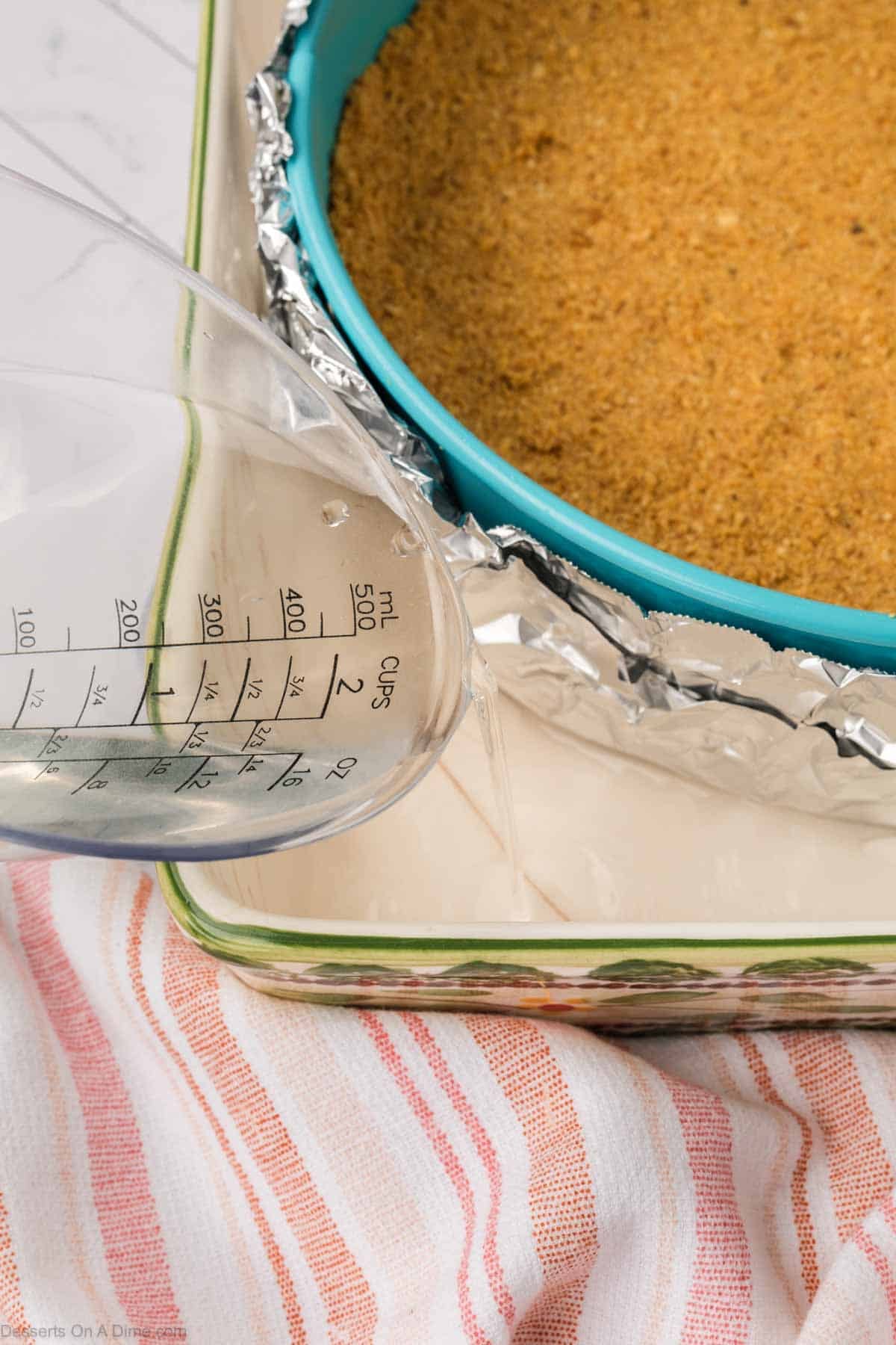 Water poured into pan. 