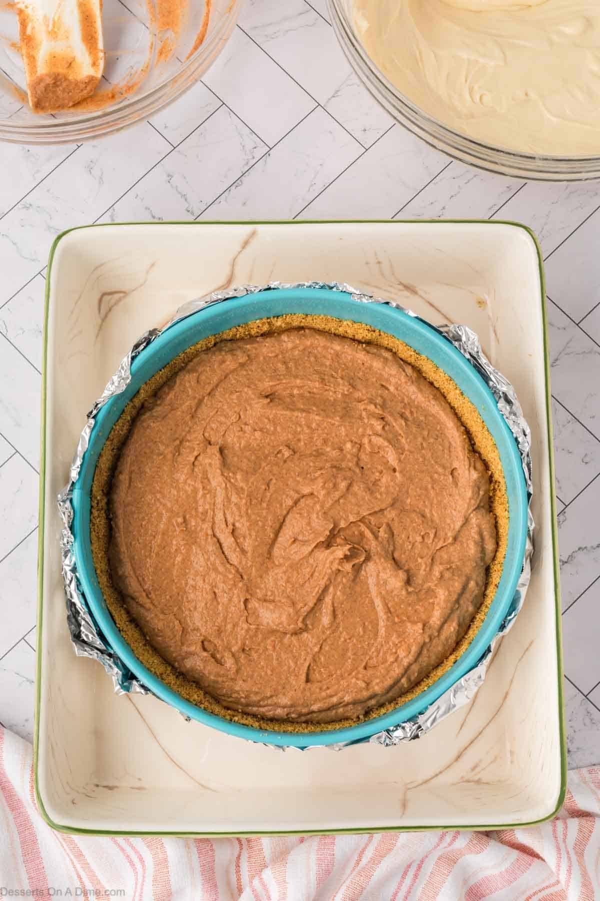 Cheesecake in water bath. 