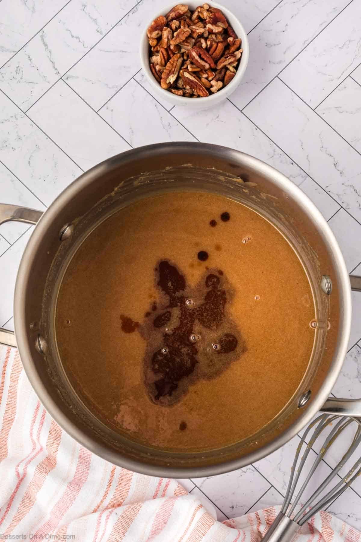 Saucepan with ingredients for salted caramel topping. 