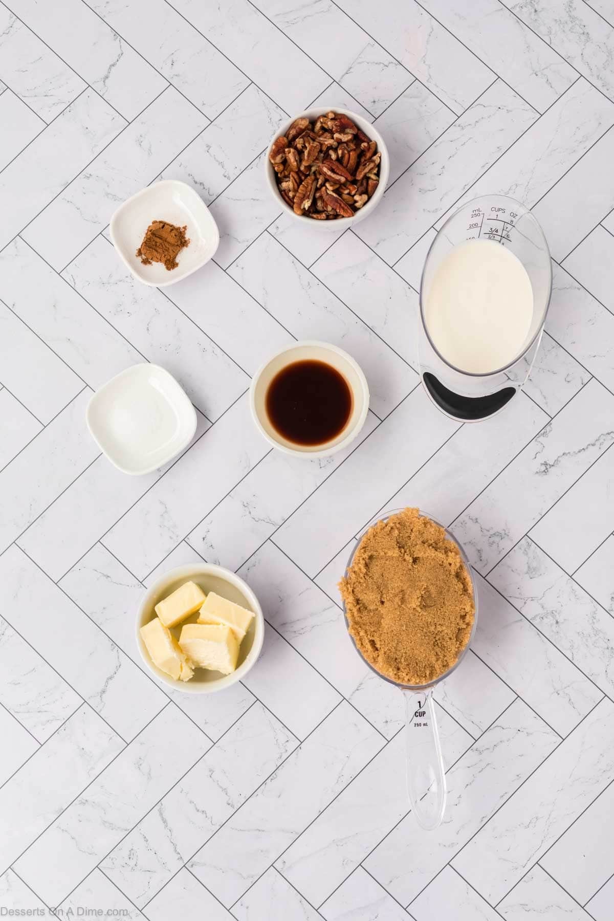 Ingredients for sweet potato cheesecake - cream cheese, eggs, sugar, sweet potato puree, pumpkin pie spice, graham cracker crumbs. 