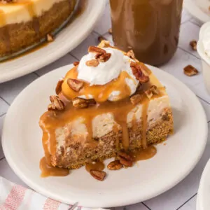 Slice of Sweet Potato cheesecake on a white plate.