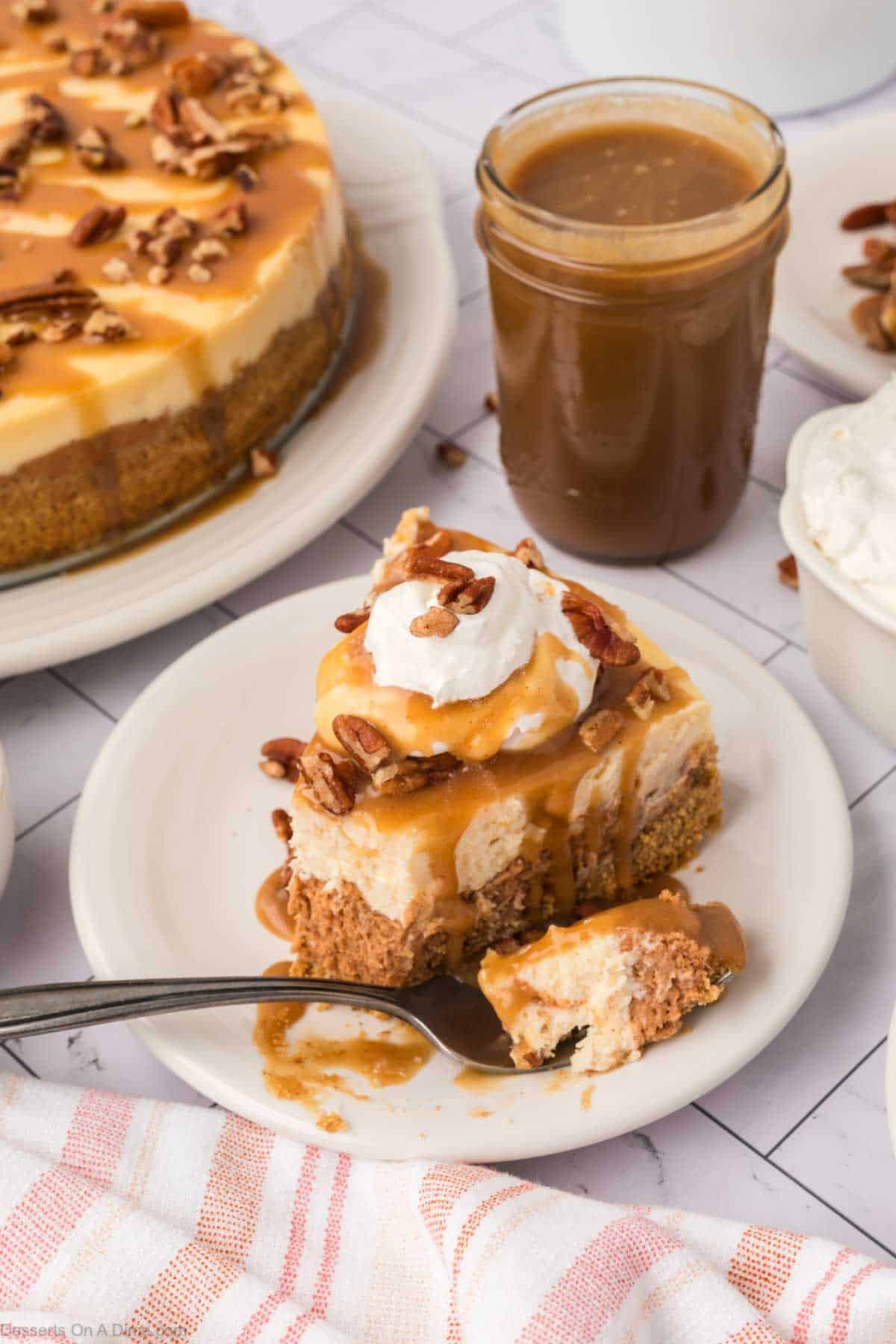 Cheesecake sliced and served on a plate. 