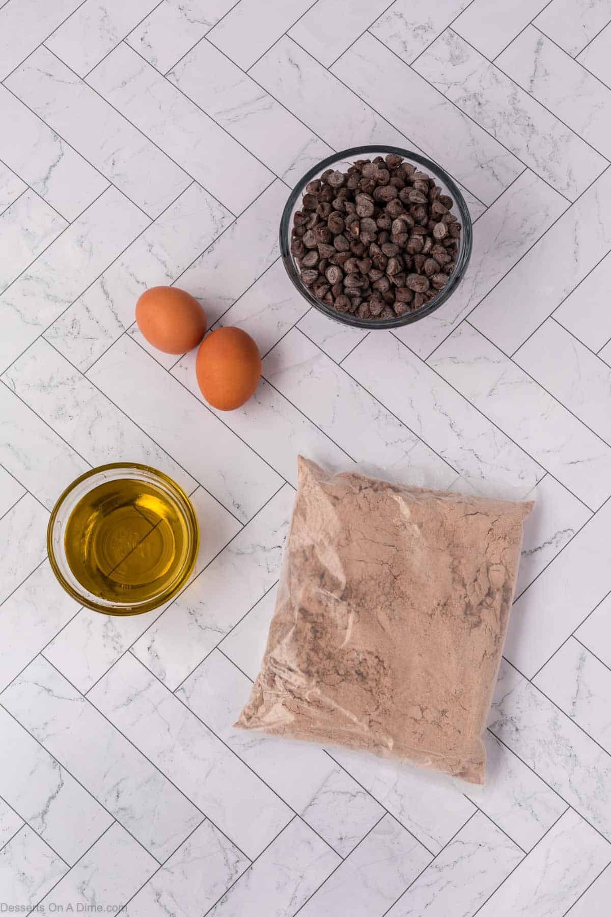 Ingredients for Devil's Food Cake Mix Cookies - eggs, chocolate chips, oil, chocolate cake mix. 