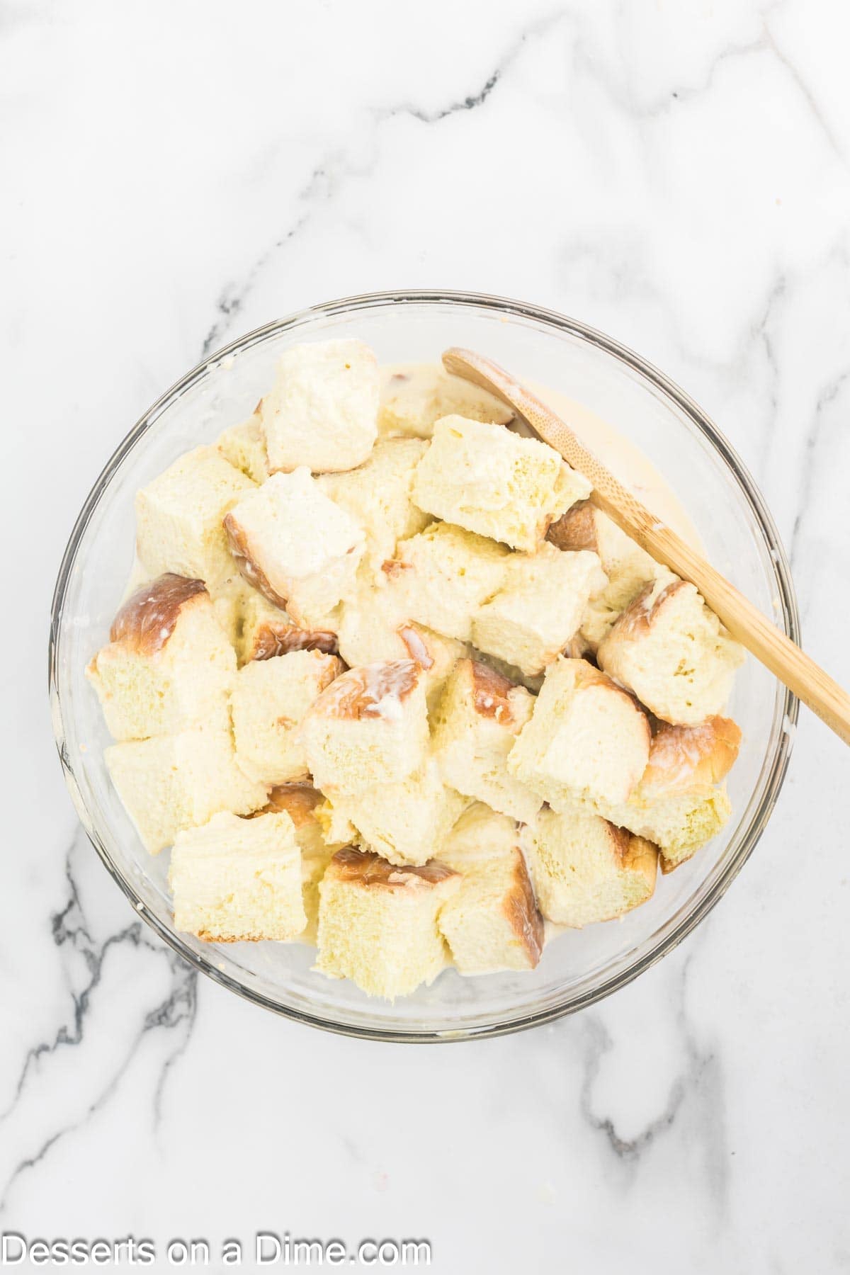 Mixing bowl with bread and custard. 