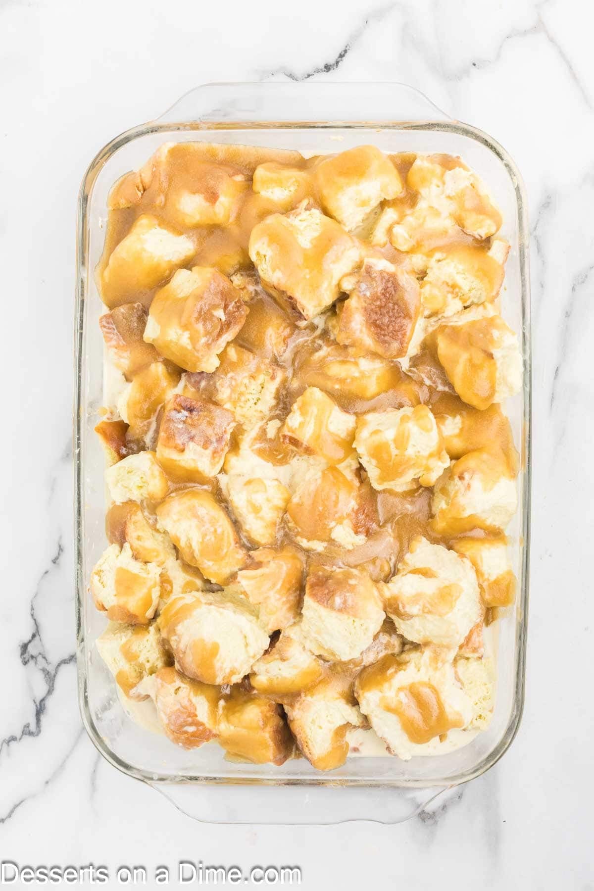 Butter mixture poured over the bread in baking dish. 