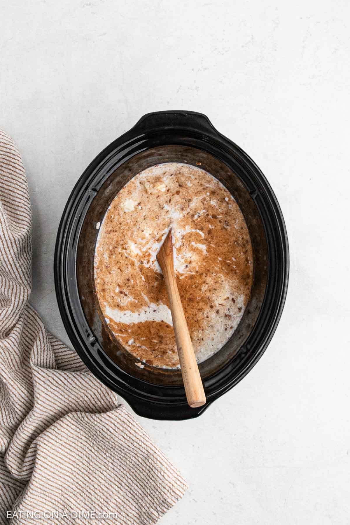 Sugar and milk combined in crock pot. 