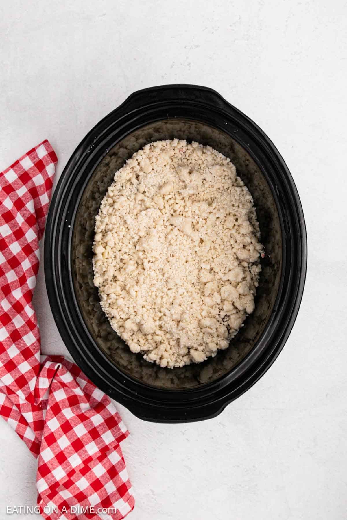 Cake mix and melted butter sprinkled on top of pie filling. 