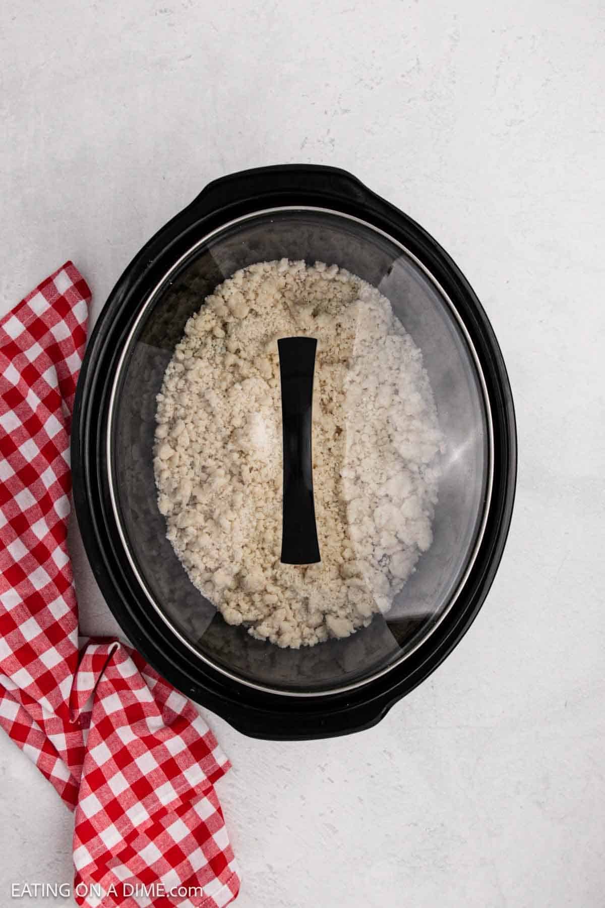 Cover on crock pot ready to cook. 