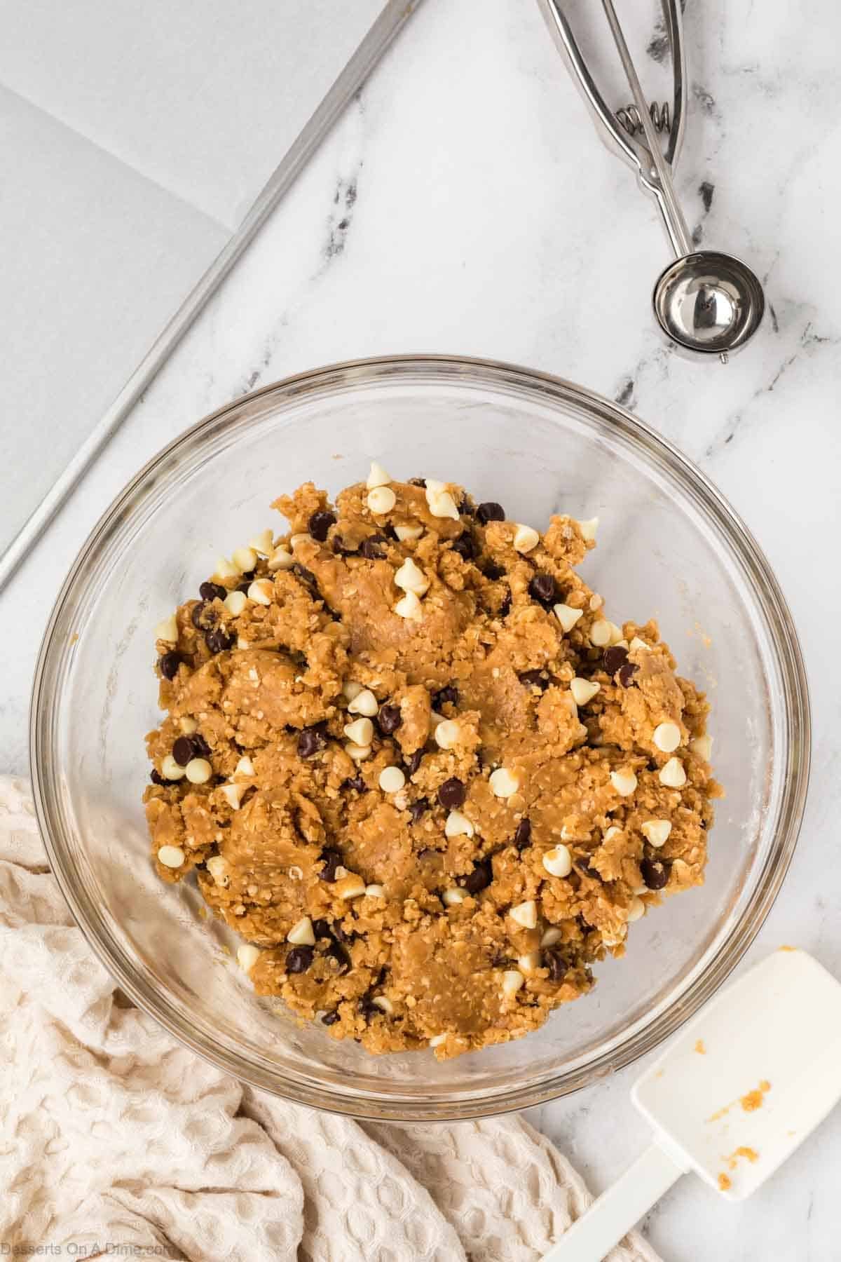 Chocolate chips and white chocolate chips folded into mixture.