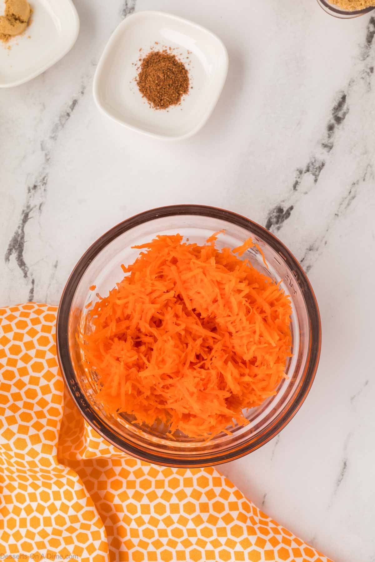 Shredded carrots in a bowl. 