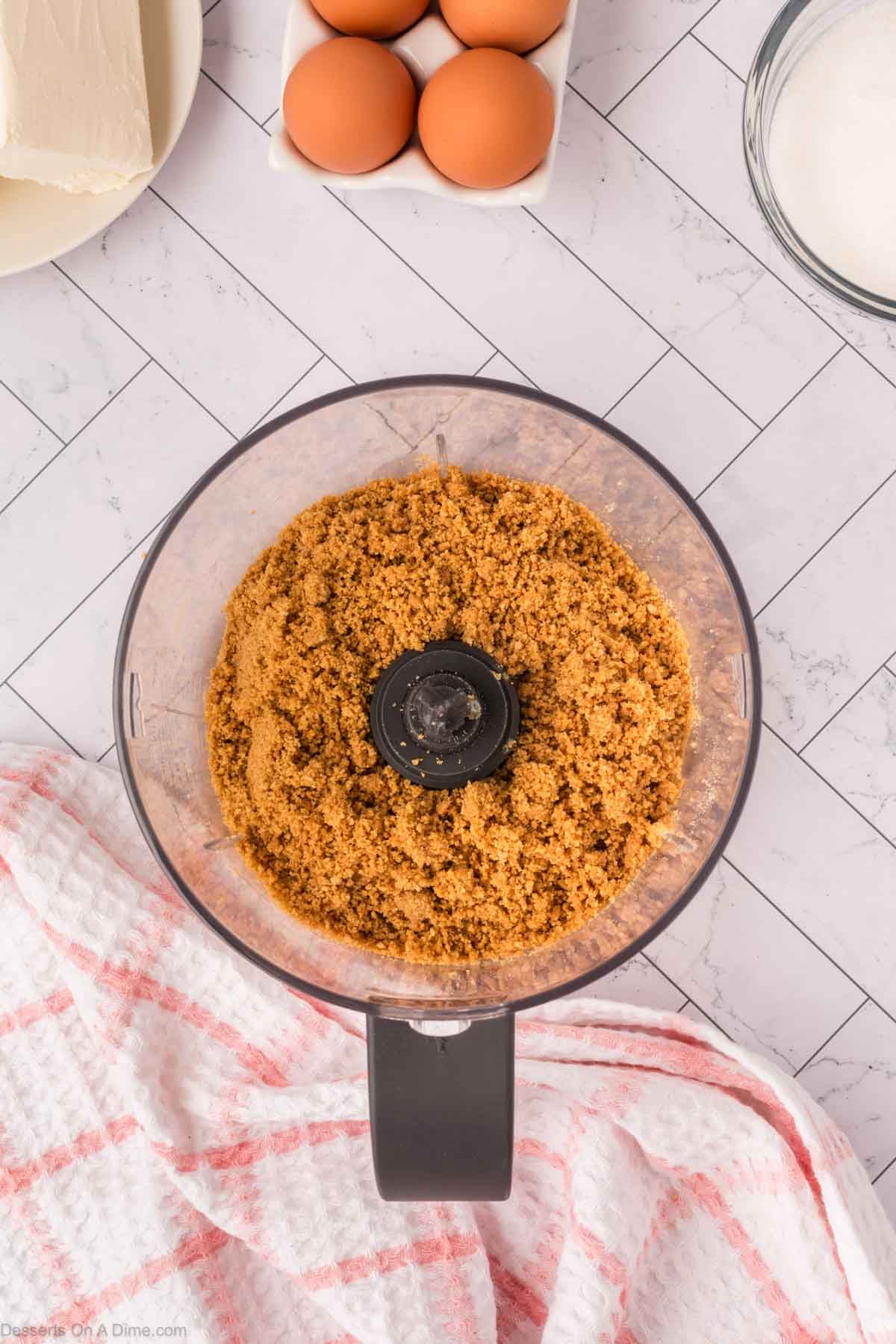 Graham cracker crumbs in a food processor. 