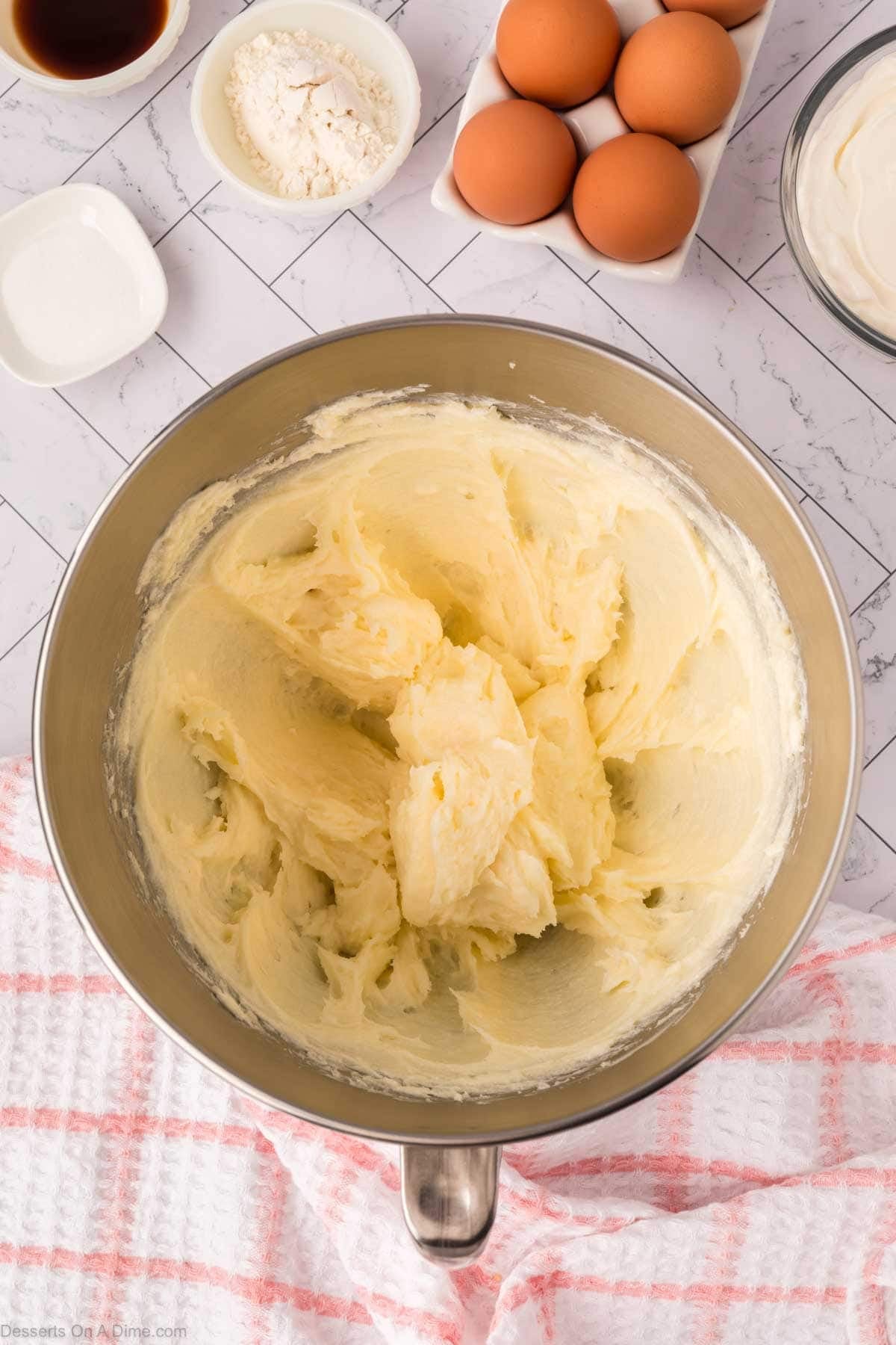 Cream cheese and sugar beat together until fluffy. 