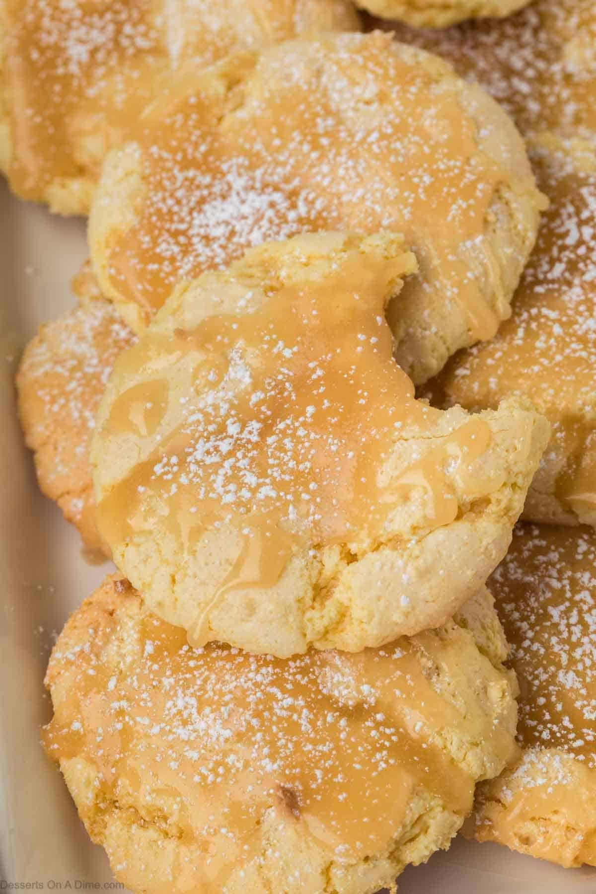 Kentucky Butter Cake Mix Cookies stacked on a baking sheet