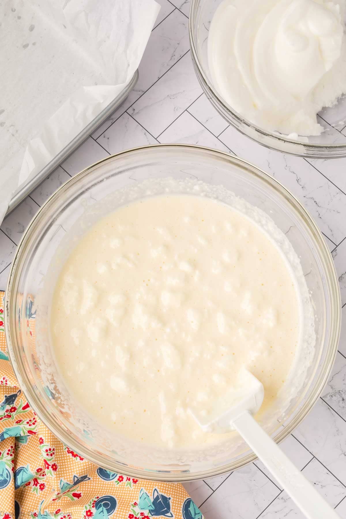 Whipped egg whites folded into batter. 