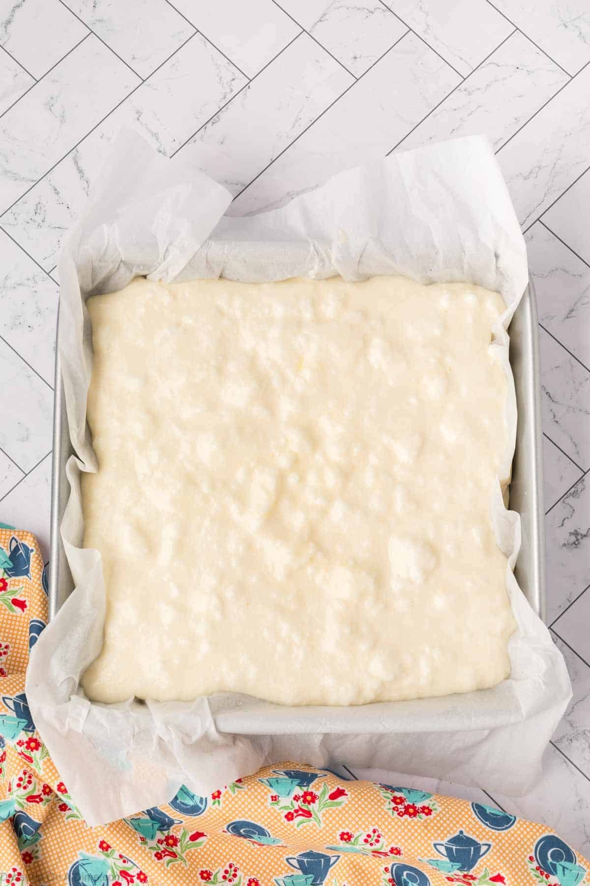 Batter spread into pan. 