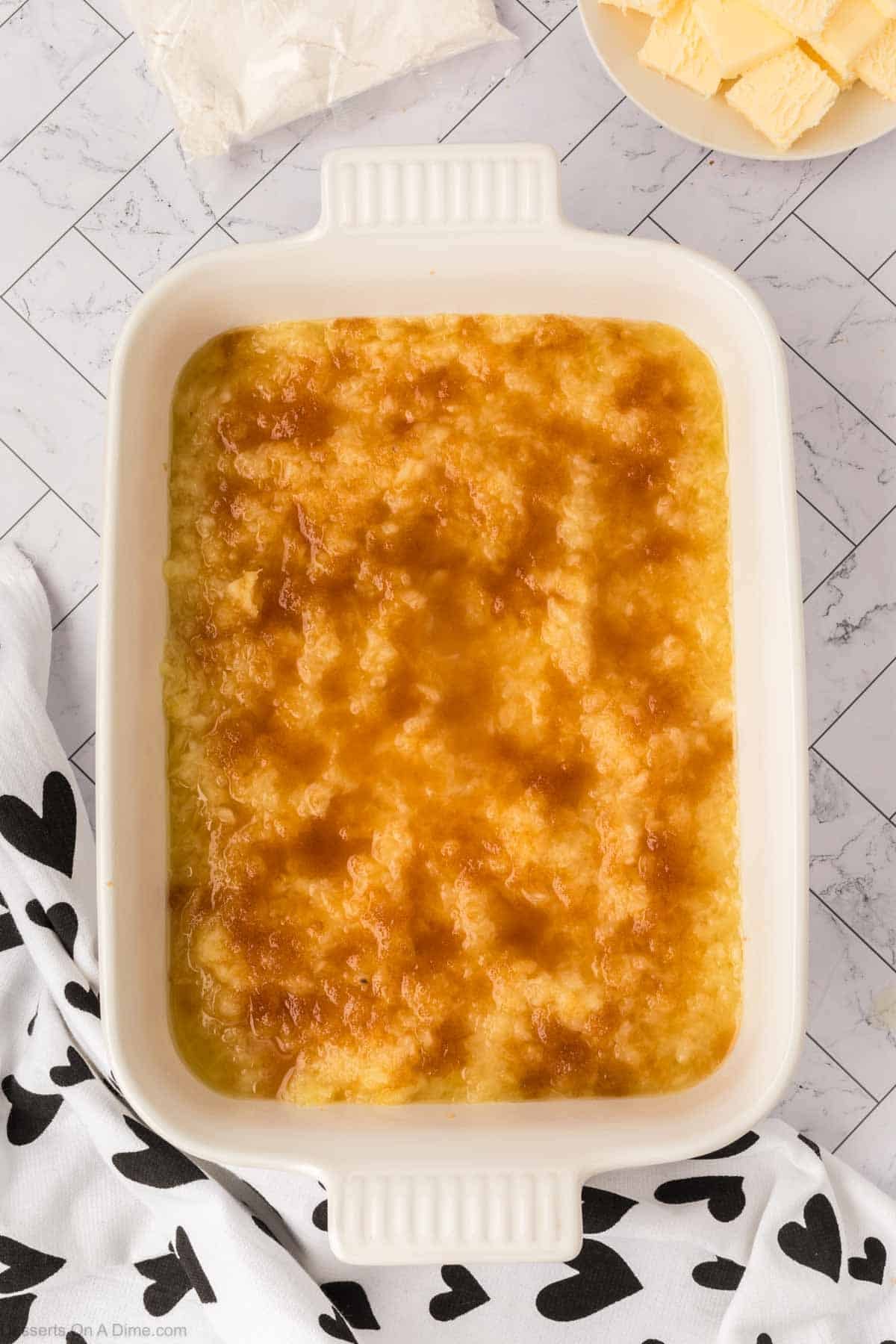 Brown sugar sprinkled over pineapple. 