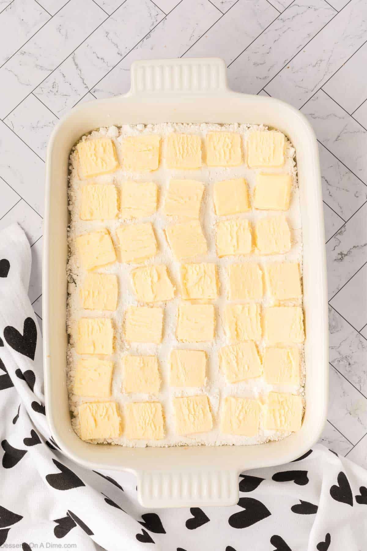 Butter slices arranged on top. 