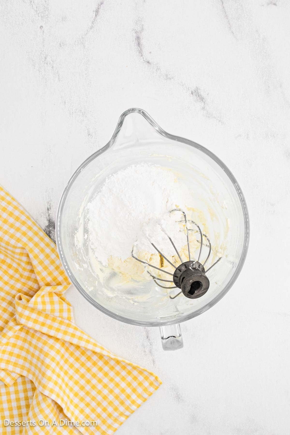 Powdered sugar poured into mixing bowl. 