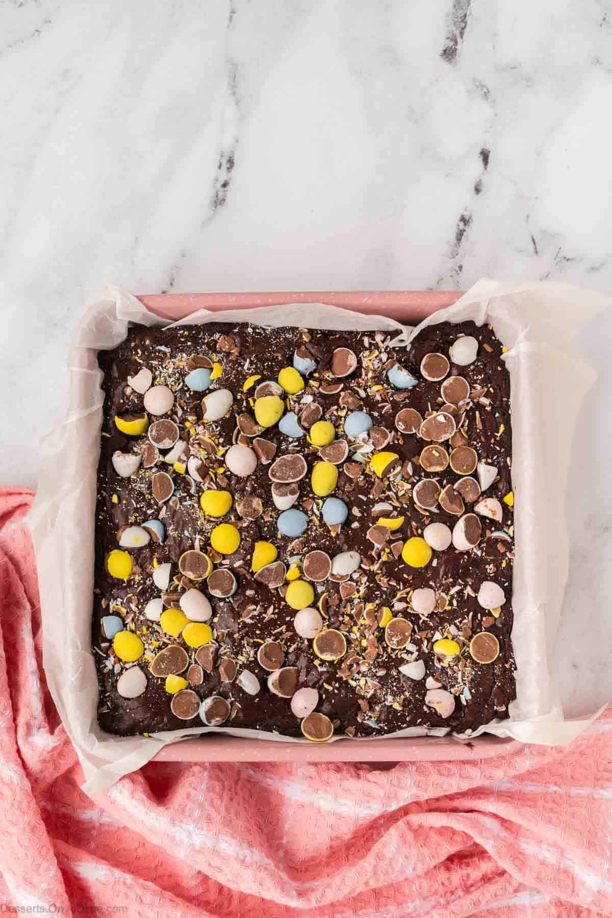 Cadbury Eggs chopped and sprinkled on top of batter. 