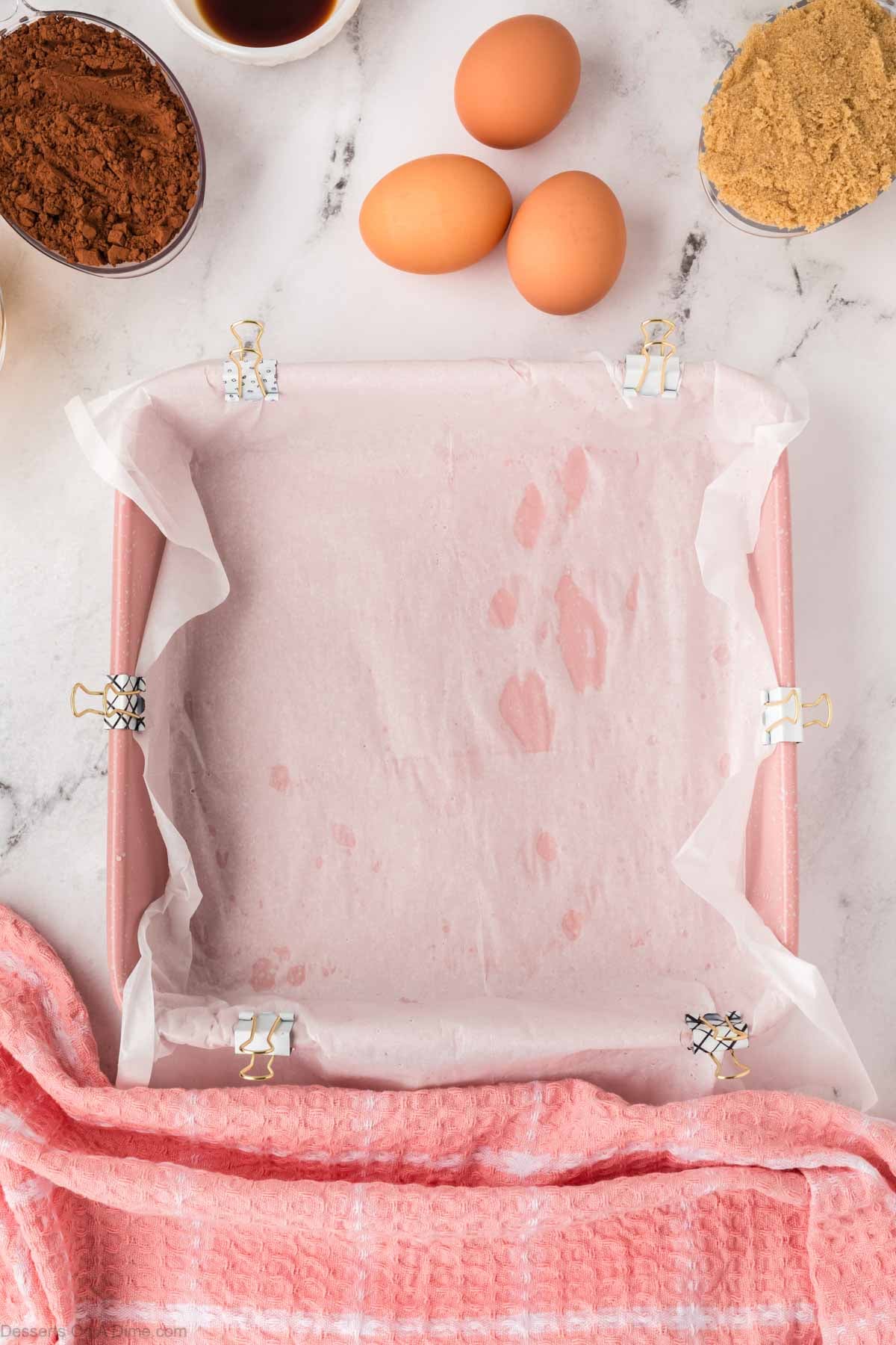 Baking pan lined with parchment paper. 