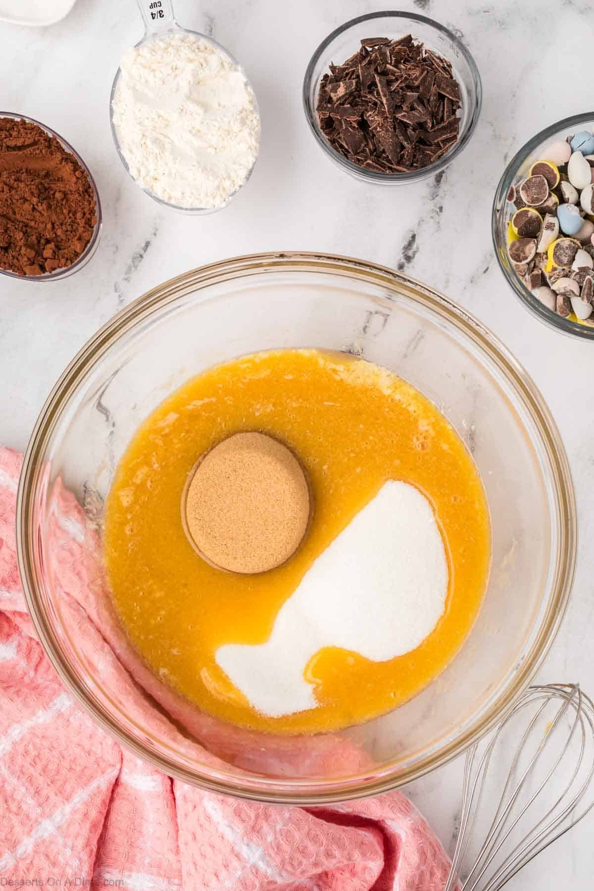 Sugar and brown sugar combined with melted butter. 