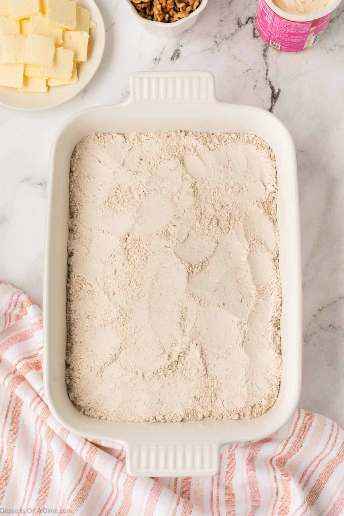 Dry cake mix spread on top. 