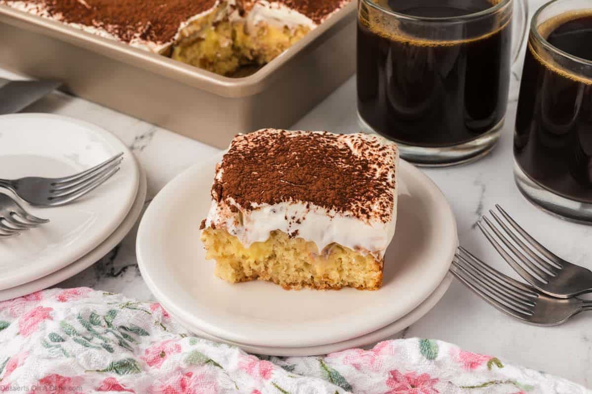 Tiramisu Poke Cake on a plate.