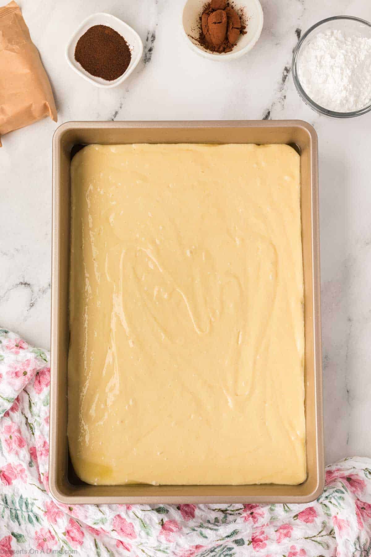 Batter spread in baking pan.