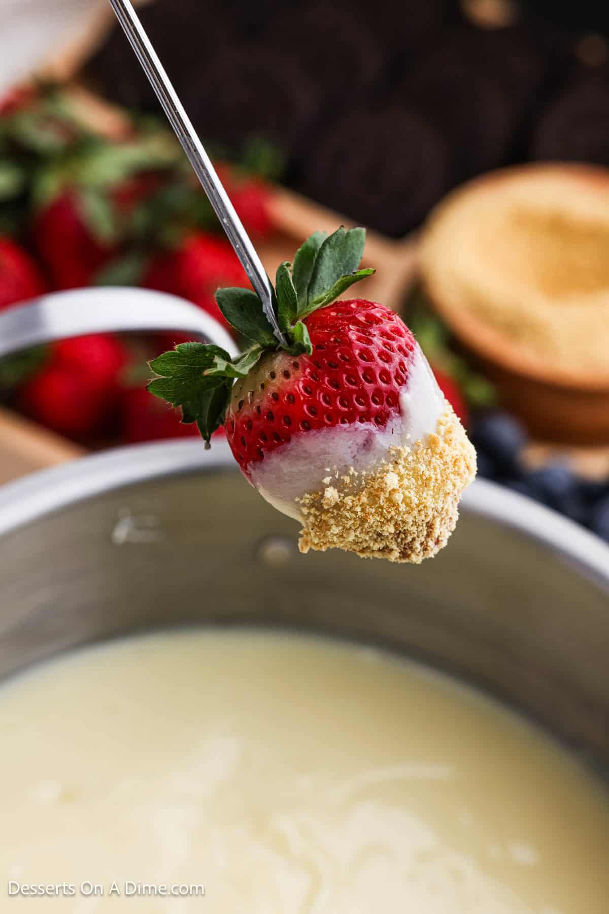 Strawberry dipped and coated in graham cracker crumbs. 