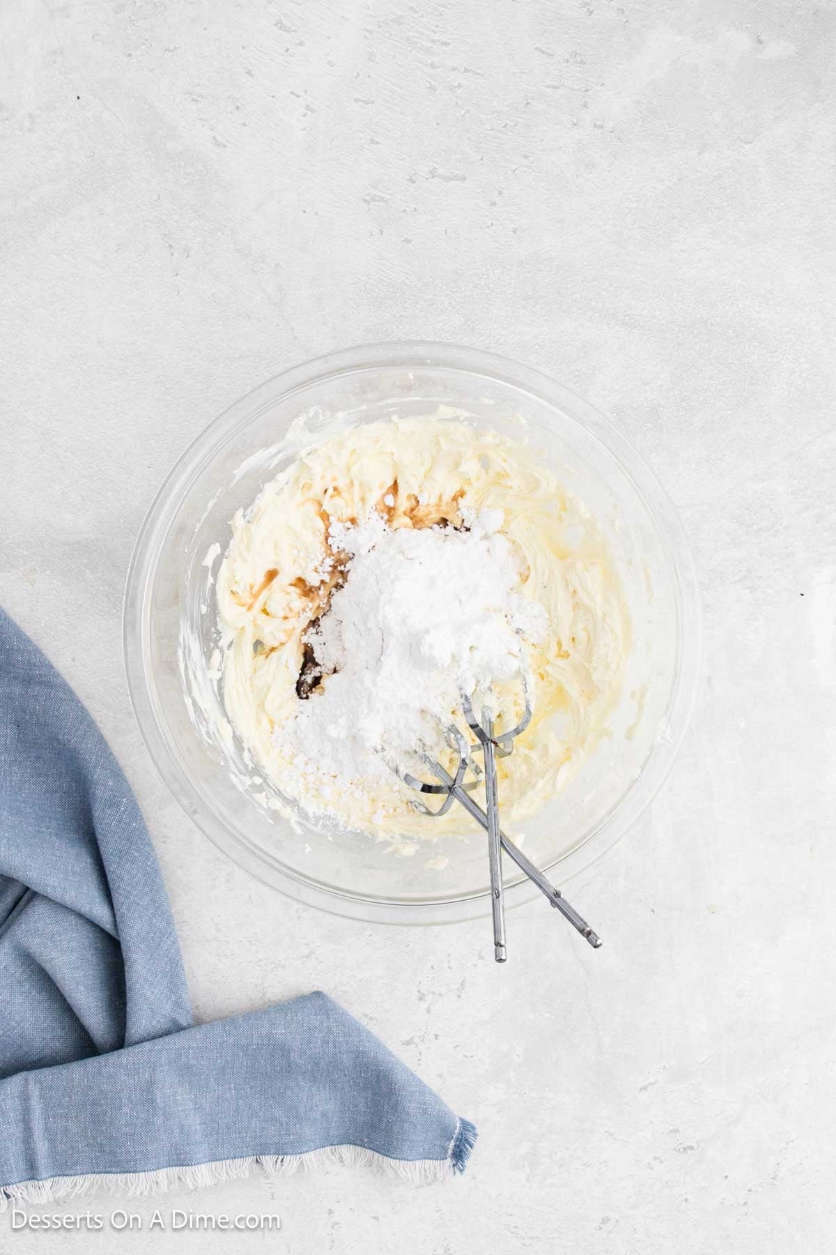 Powdered sugar added to cream cheese mixture. 