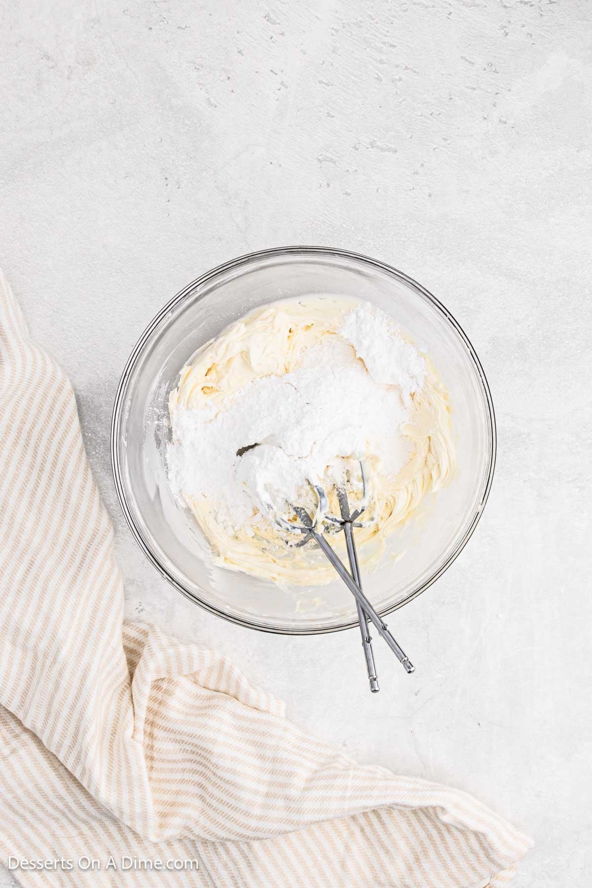 Powdered Sugar added to mixture in bowl. 