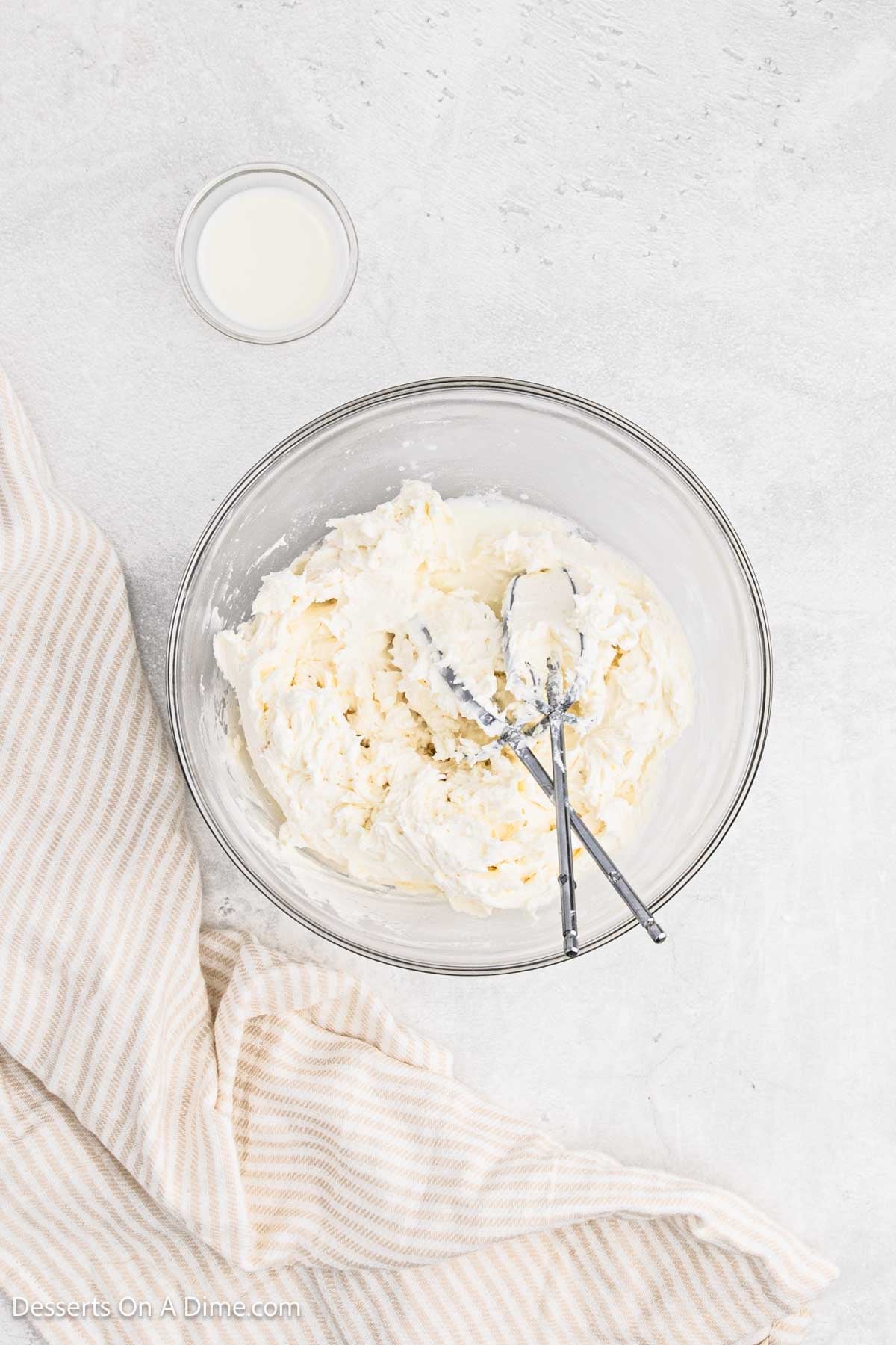 Mixture in bowl combined together. 