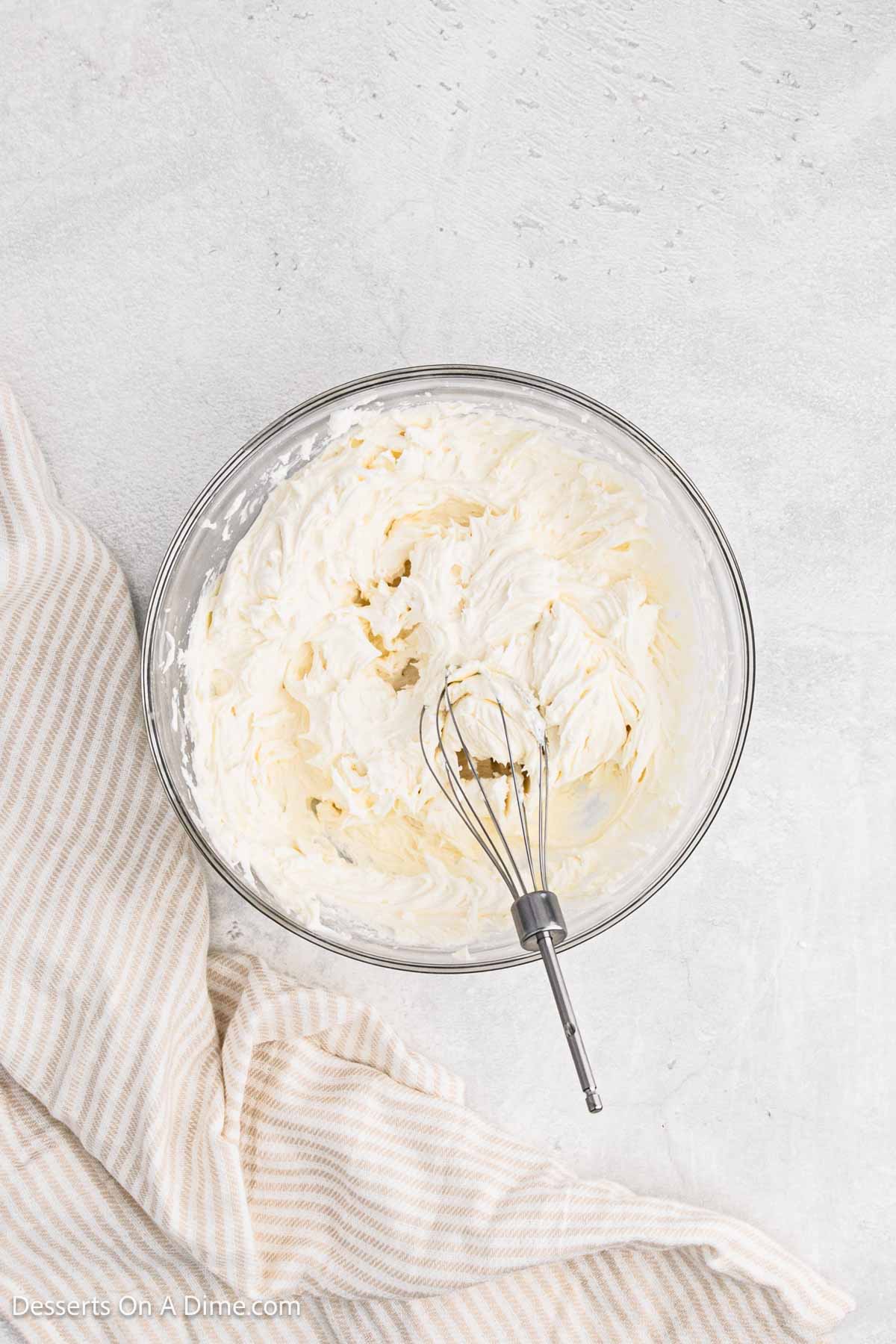 Whisk beating frosting until fluffy. 