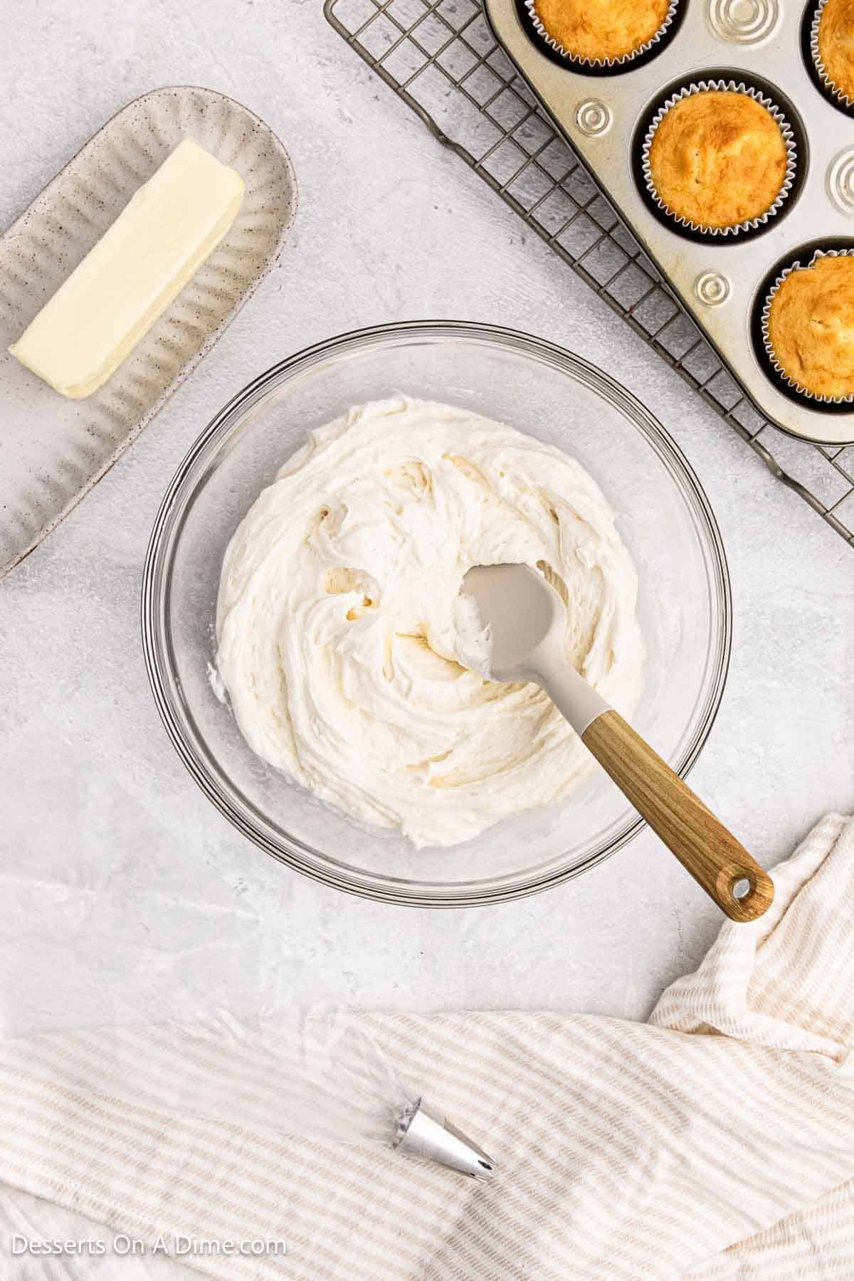 Milk added to mixture in bowl. 