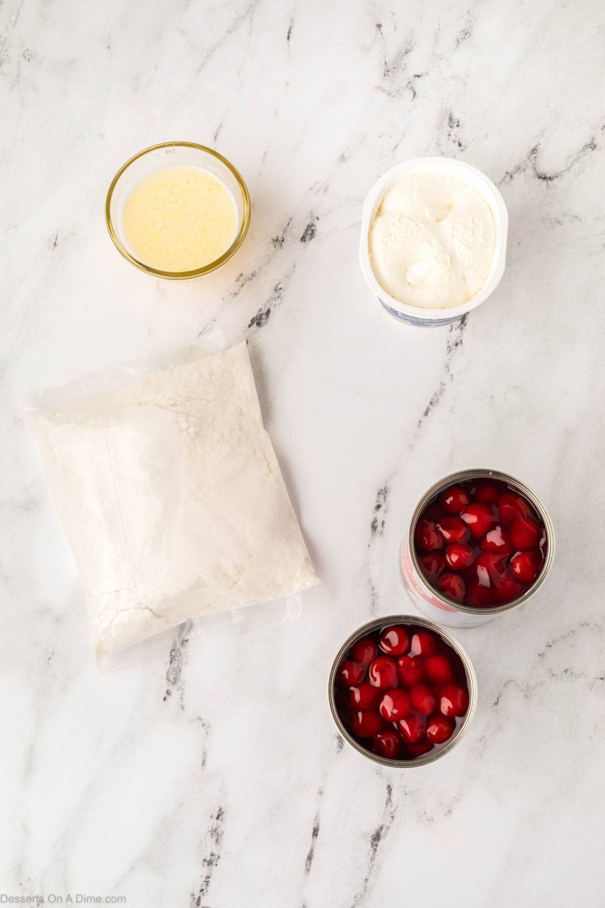 Ingredients for recipe: cherry pie filling, whipped cream cheese, cake mix, butter. 