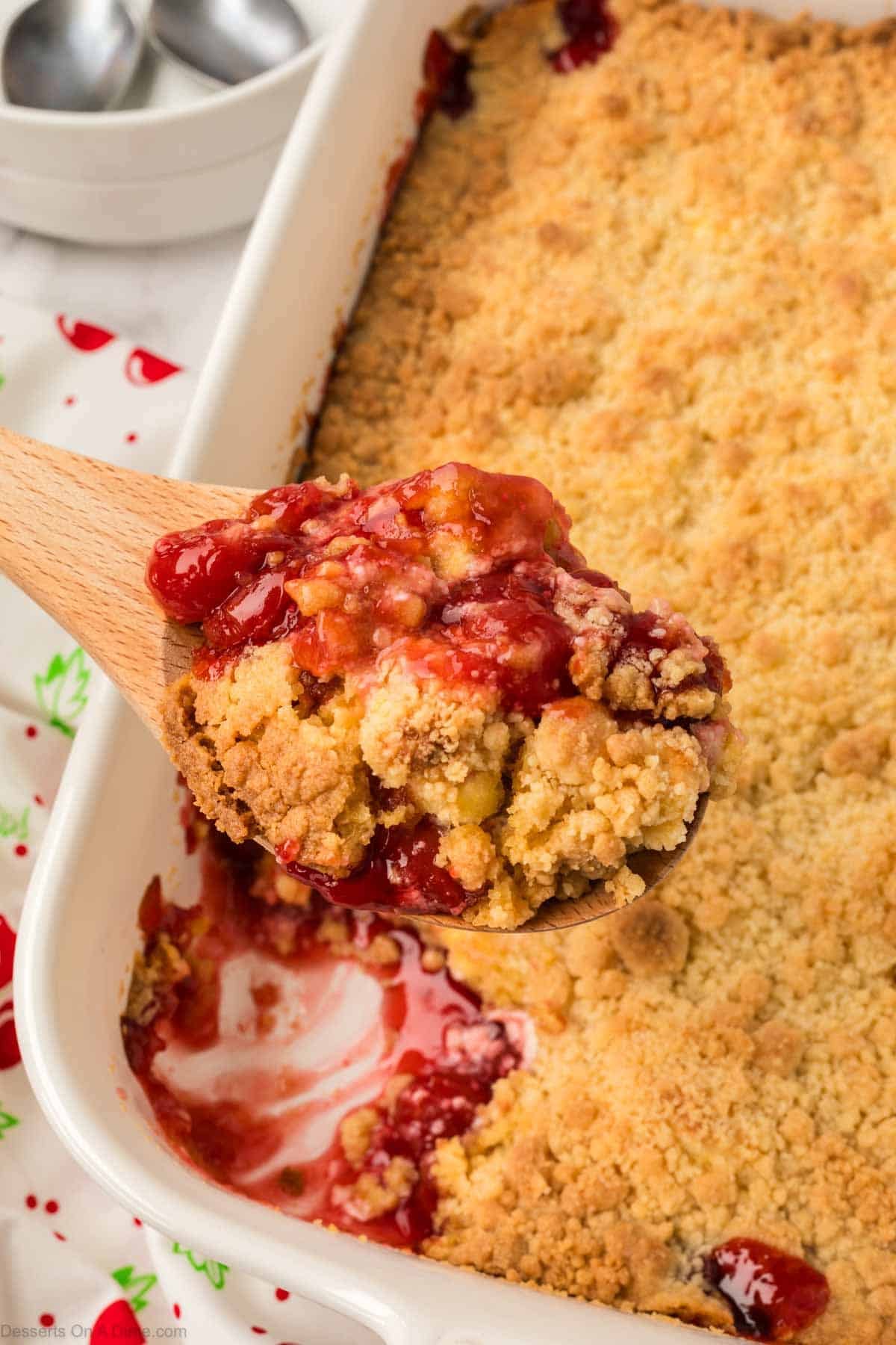 Spoon serving dump cake. 