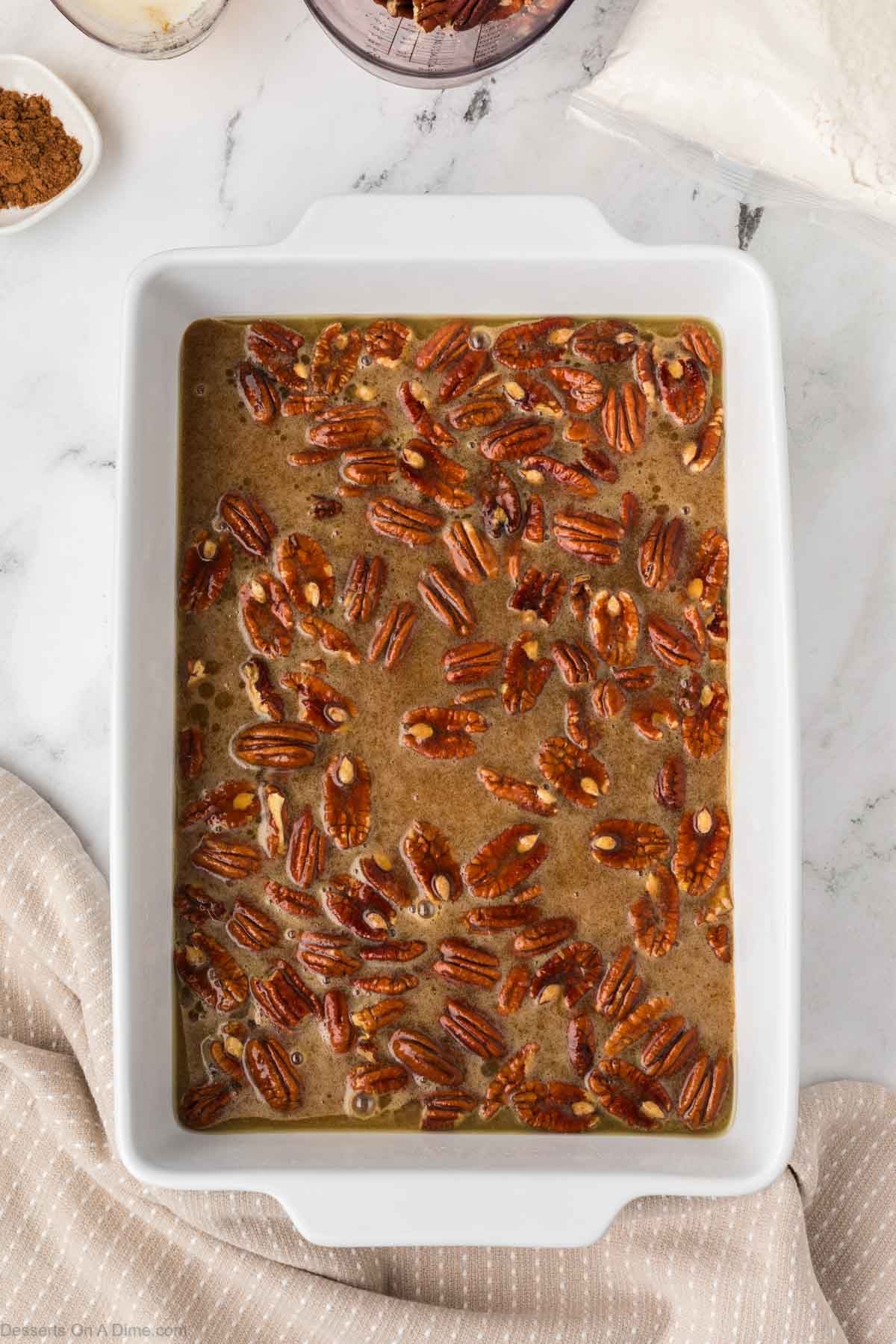 Mixture spread into baking dish.